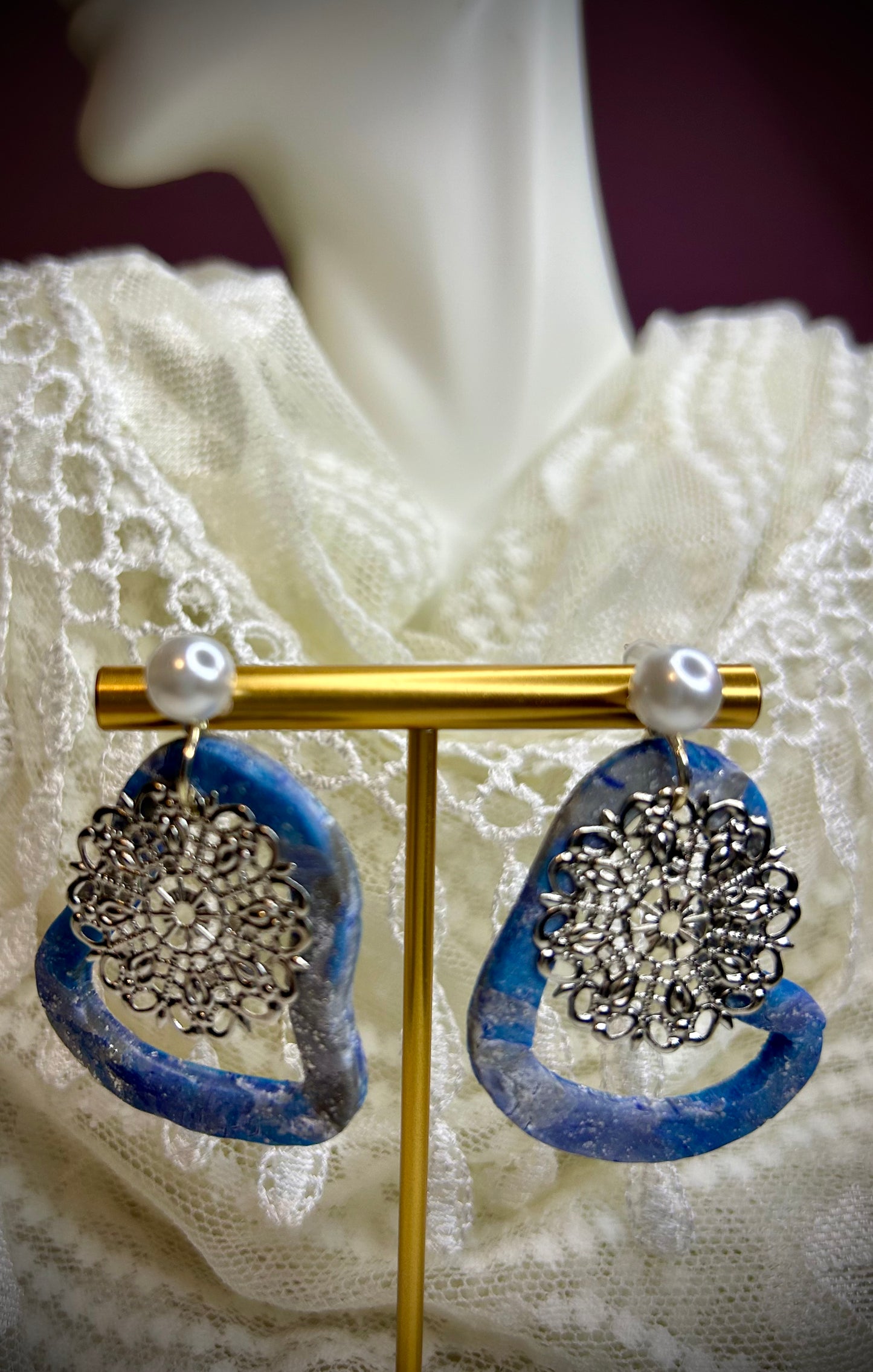 Boho Silver Mandala earrings featuring irregular blue and silver marbled hoops and faux pearl pushback posts pierced ears gift for her

Key Features:
- Bohemian Style Earrings
- Irregular Blue and Silver Marbled Hoops
- Faux Pearl Pushback Post