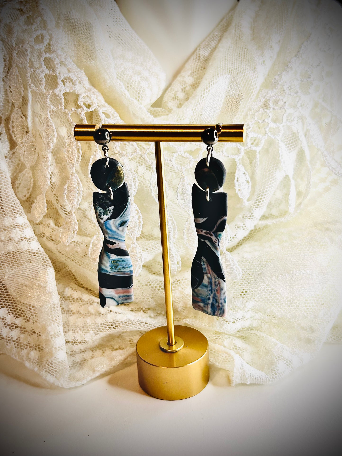 “My body my rights” feminist activism themed hand sculpted dangle drop embedded pushback post earrings for pierced ears featuring abstract planet earth impressionism within female body curvature outlines